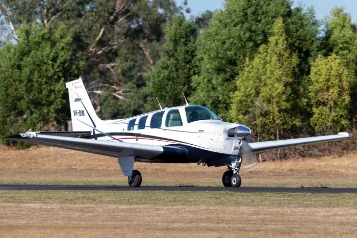 A picture of a single-engine Beechcraft A36 airplane.